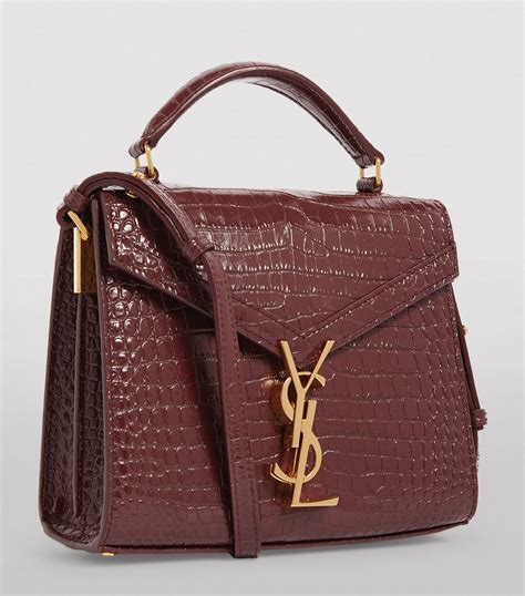 ysl cassandra mini croc|CASSANDRA Mini top handle bag in grain de poudre .